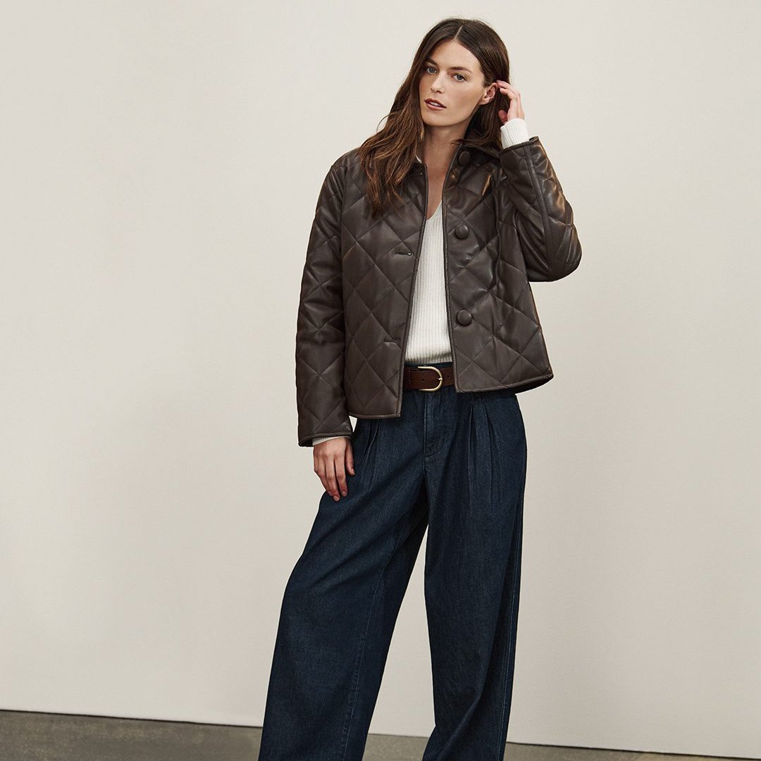 Jacket, white shirt, and jeans on female model for Banana Republic Factory.