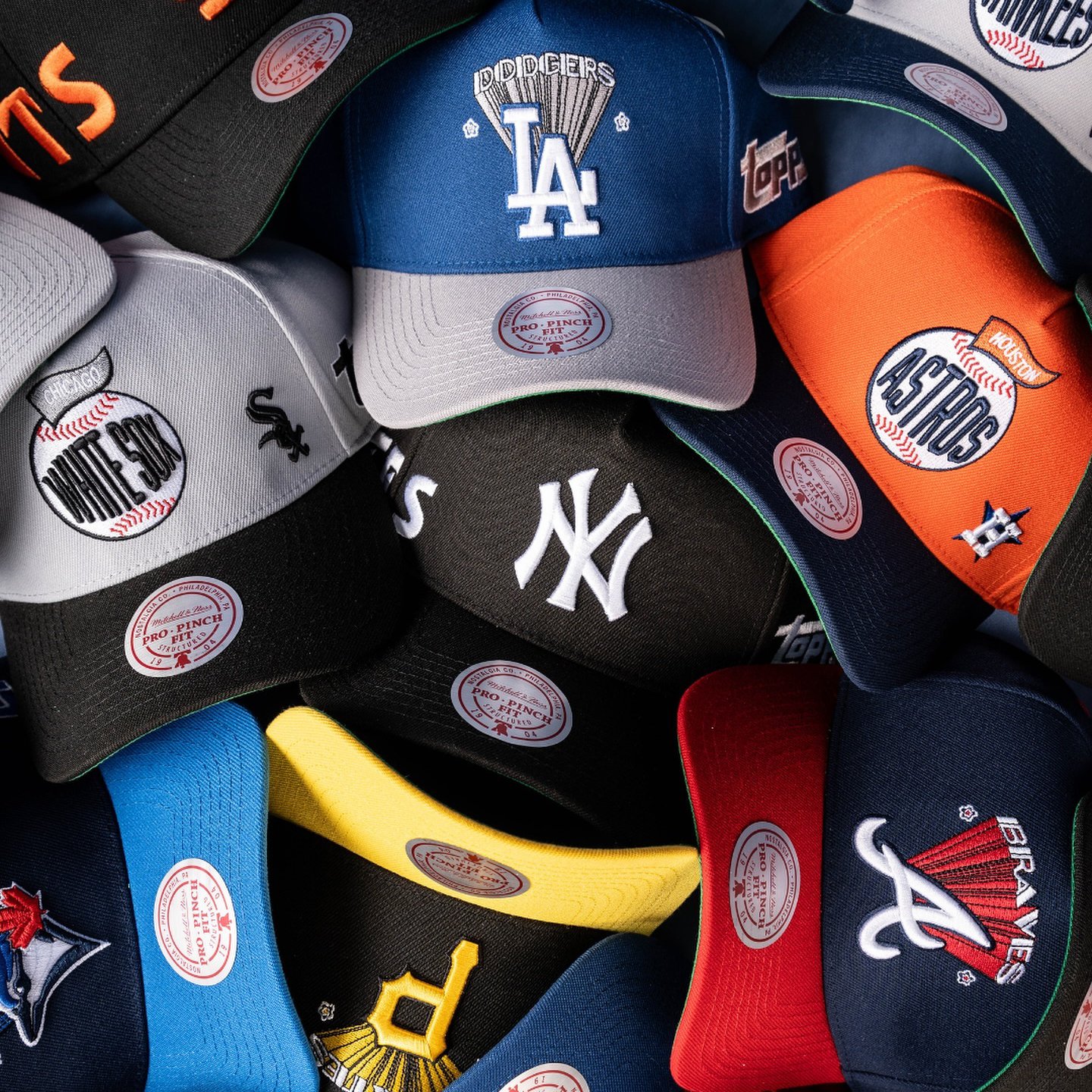 Pile of caps from Lids.